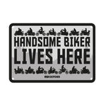 Oxford Garage Metal Sign: Handsome Biker Lives Here